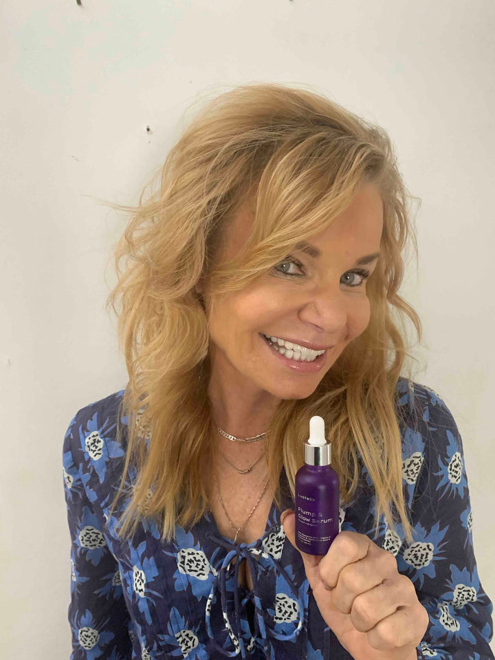 Lustelle customer with serum in hand