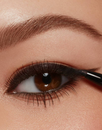 Load image into Gallery viewer, Buy 1 Plump &amp; Glow Serum - Get a FREE Waterproof Eyeliner!
